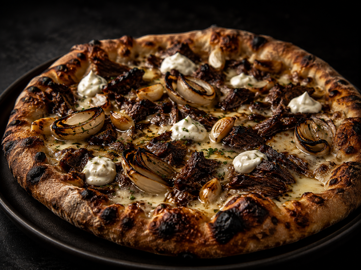 Chef pizza with braised beef, charred onion and whipped cheese