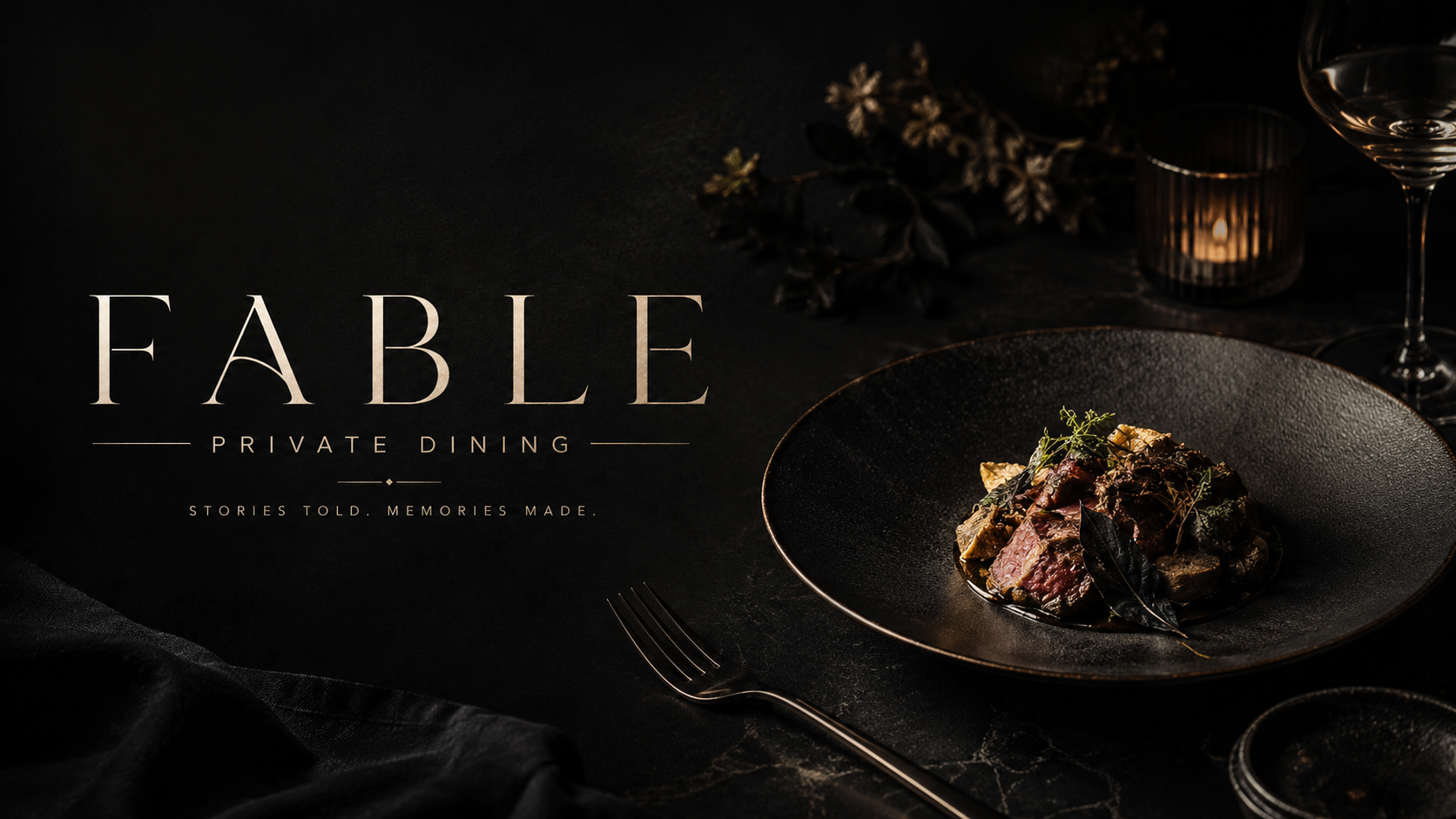 Plated FABLE course on dark ceramic with candlelight, wine and linen