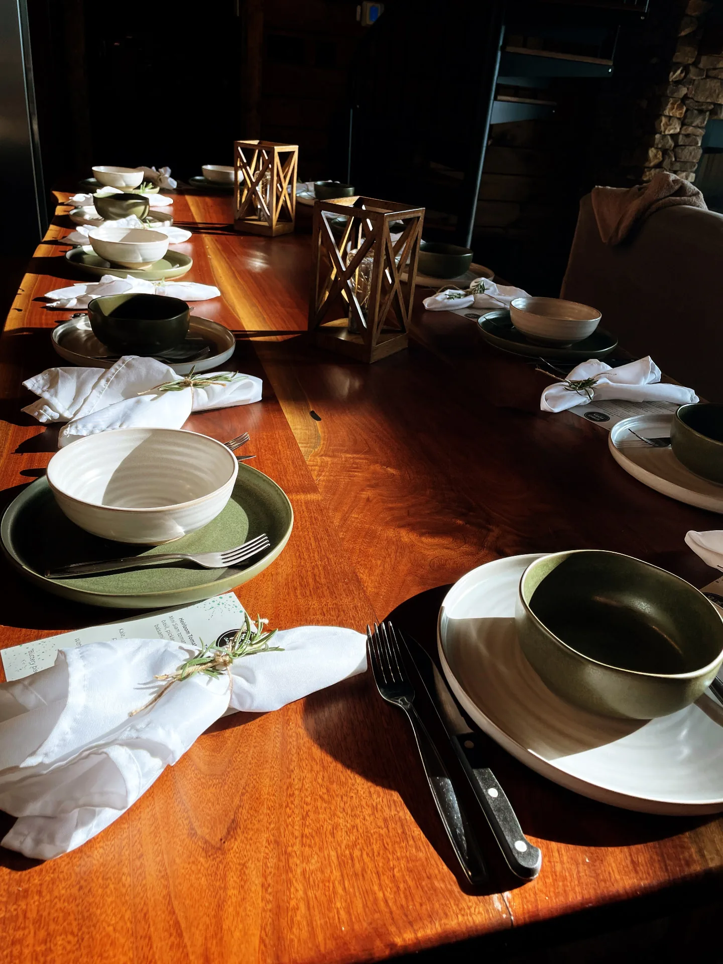 A table set for a relaxed private tavern dinner at home